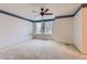 Spacious bedroom with carpeting and window shutters at 6712 E Briarwood Dr, Centennial, CO 80112