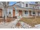 Inviting exterior of townhome with landscaping and walkway at 6712 E Briarwood Dr, Centennial, CO 80112