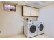 Laundry room with washer and dryer at 6712 E Briarwood Dr, Centennial, CO 80112