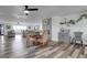 Cozy dining area with a glass-top table and chairs near a fireplace at 37994 E 144Th Ave, Hudson, CO 80642