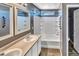 A well-lit bathroom showcases a tub and shower combination and sleek fixtures at 5747 E Monument Dr, Castle Rock, CO 80104