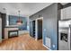Open concept kitchen area with stainless steel appliances, ample storage, and seamless transition to the living room at 5747 E Monument Dr, Castle Rock, CO 80104