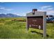 Westminster Hills Open Space dog park and Greenway Trail sign with a mountain view at 10792 Moore St, Broomfield, CO 80021