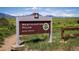 Westminster Hills Open Space sign with the Rocky Mountains in the background at 10792 Moore St, Broomfield, CO 80021