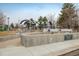 Gathering-friendly community playground featuring a mix of play equipment and picnic tables for outdoor fun at 10792 Moore St, Broomfield, CO 80021