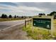 Standley Lake Regional Park wildlife refuge sign in Westminster by a rural road at 10792 Moore St, Broomfield, CO 80021