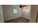 Bedroom features neutral paint, carpet, a ceiling fan and good natural light at 12170 Huron St # 106, Denver, CO 80234