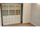 This closet features built in shelving and storage at 12170 Huron St # 106, Denver, CO 80234
