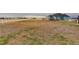 Expansive backyard with white fencing creating a serene and private outdoor space at 38025 E 145Th Pl, Keenesburg, CO 80643