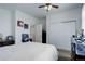 Cozy bedroom with double closet and white comforter, offering a peaceful retreat at 38025 E 145Th Pl, Keenesburg, CO 80643