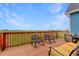 Inviting deck with comfortable seating offers panoramic views of the surrounding landscape at 38025 E 145Th Pl, Keenesburg, CO 80643