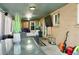 Enclosed patio with brick walls, concrete floors and modern patio furniture at 1375 N Iola St, Aurora, CO 80010