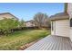 This is a spacious backyard with wood fence at 12507 Dexter Way, Thornton, CO 80241