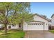 Charming home featuring an attached two-car garage and a well-maintained front lawn at 12507 Dexter Way, Thornton, CO 80241