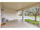 Spacious covered front porch with views of the street and neighborhood playground at 12507 Dexter Way, Thornton, CO 80241