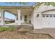 Welcoming covered front porch offering a charming entry to the home at 12507 Dexter Way, Thornton, CO 80241