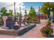 Unique street art and landscaping enhance the neighborhood, complemented by decorative streetlights and nearby shops at 10321 W 59Th Ave # 2, Arvada, CO 80004