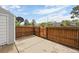 Backyard with a patio and tall wood fence offering privacy and outdoor enjoyment at 4020 E 94Th Ave # B, Thornton, CO 80229