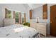 Bright bedroom with white walls, a large window, and light-colored furniture at 4020 E 94Th Ave # B, Thornton, CO 80229