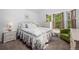 Cozy bedroom featuring a floral-patterned bedspread and a bright window seat at 4020 E 94Th Ave # B, Thornton, CO 80229