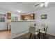 Bright dining area is open to the kitchen, perfect for casual meals and entertaining at 4020 E 94Th Ave # B, Thornton, CO 80229