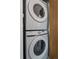 Stacked Samsung washer and dryer in a laundry closet, offering space-saving convenience at 4020 E 94Th Ave # B, Thornton, CO 80229