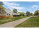 Charming suburban street view featuring well-maintained lawns and sidewalks on a sunny day at 4020 E 94Th Ave # B, Thornton, CO 80229