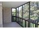 Balcony featuring brick walls with views of the outdoor landscape at 14390 E Marina Dr # 204, Aurora, CO 80014