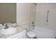 Full bathroom features a tile shower and single sink at 14390 E Marina Dr # 204, Aurora, CO 80014