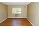 Inviting bedroom with hardwood floors, a window, and neutral walls at 14390 E Marina Dr # 204, Aurora, CO 80014