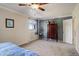 Bedroom featuring a decorative dresser, window and soft carpet at 18605 E Saratoga Pl, Aurora, CO 80015