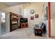 Bright living room with vaulted ceilings, a fireplace, large windows, and comfortable seating at 18605 E Saratoga Pl, Aurora, CO 80015