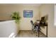 Home office space with a sleek desk, comfortable chair, and ample natural light at 18605 E Saratoga Pl, Aurora, CO 80015