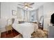 Bright bedroom featuring a large bed, ample natural light, and an elegant design at 444 17Th St # 807, Denver, CO 80202