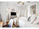 Bright bedroom features modern decor, a ceiling fan, and neutral color palette at 444 17Th St # 807, Denver, CO 80202
