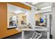Community gym featuring free weights, machines, and a view to the outside at 444 17Th St # 807, Denver, CO 80202