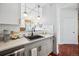 Modern kitchen with granite countertops and open sight lines at 444 17Th St # 807, Denver, CO 80202