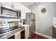 Modern kitchen with stainless steel appliances, granite countertops, and ample storage at 444 17Th St # 807, Denver, CO 80202