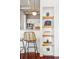 Close up of the stylish kitchenette with bar seating and modern appliances at 444 17Th St # 807, Denver, CO 80202