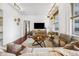 Spacious living room with modern decor, hardwood floors, and ample natural light at 444 17Th St # 807, Denver, CO 80202
