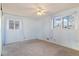 Bedroom with bright blue walls and plush carpeting at 10636 Ura Ln, Northglenn, CO 80234