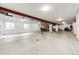 Spacious unfinished basement with bright, white walls offers a blank canvas for customization and storage at 196 W 8Th Ave, Byers, CO 80103