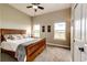 Bedroom featuring a comfortable bed, neutral tones, and natural light at 196 W 8Th Ave, Byers, CO 80103