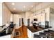 Modern kitchen with stainless steel appliances, black countertops, and hardwood flooring at 196 W 8Th Ave, Byers, CO 80103