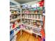 Walk-in pantry with organized shelving and ample storage space for food and household items at 196 W 8Th Ave, Byers, CO 80103