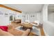Open-concept living area with stylish furniture and a bright, airy feel at 2921 S Holly Pl, Denver, CO 80222