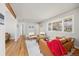 Spacious living area with hardwood floors, natural light, and neutral paint at 2921 S Holly Pl, Denver, CO 80222