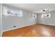 Spacious main bedroom with hardwood floors, neutral walls, and lots of natural light at 10949 E 109Th Pl, Northglenn, CO 80233