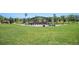 Lush green park featuring a pavilion and splash fountain, inviting visitors to enjoy outdoor recreation at 1044 Rockhurst Dr # 207, Highlands Ranch, CO 80129