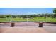 Fountain area in the park, with arch in the background, featuring green space at 1044 Rockhurst Dr # 207, Highlands Ranch, CO 80129